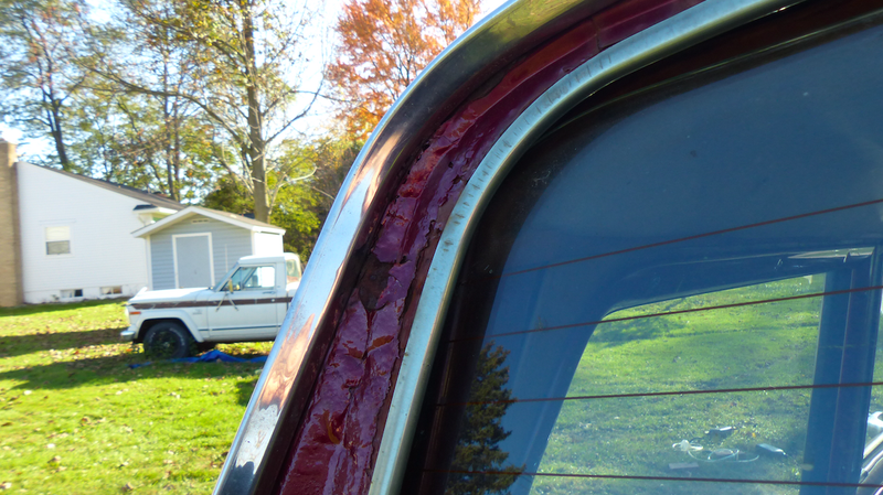 Rust around the rear glass.
